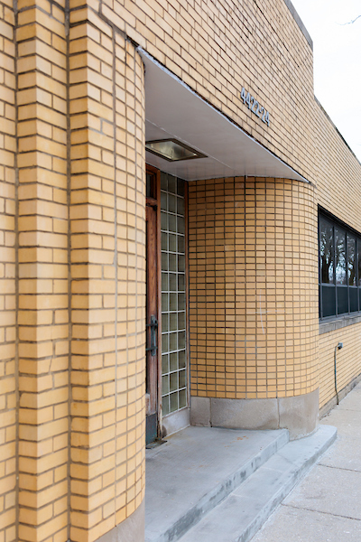 Brick exterior entrance of Platform Coworking on Ravenswood Avenue